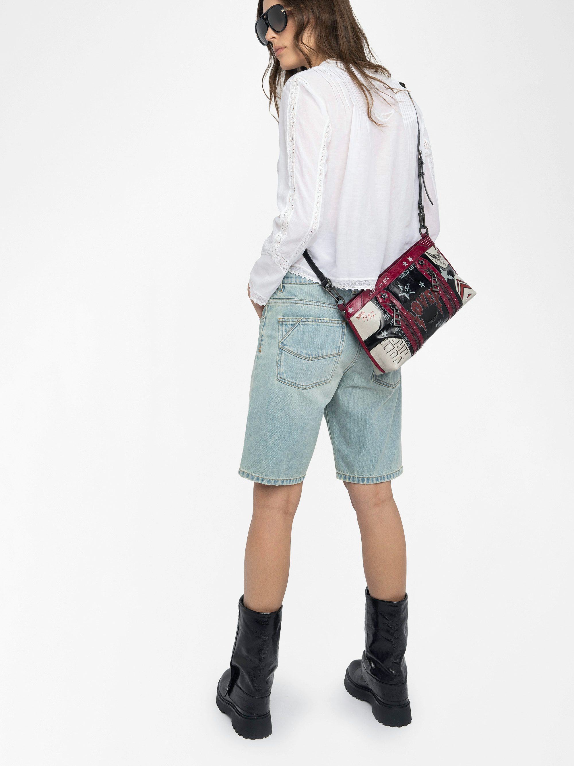 Sunny Moody Punk Bag - Vintage-inspired patent leather bag with adjustable shoulder strap and wing signature.